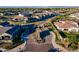 Neighborhood entrance with lush landscaping, decorative stone features, and inviting streets at 3332 S Quinn Ave, Gilbert, AZ 85297