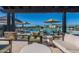 Lounge area with comfortable seating overlooks a community pool and amenities at 3332 S Quinn Ave, Gilbert, AZ 85297