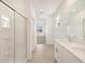 Bathroom with double sink vanity, tile flooring and a glass shower at 335 S San Gregorio Ln, Casa Grande, AZ 85194