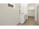 Bathroom with double sink vanity, tile flooring, and a shower at 335 S San Gregorio Ln, Casa Grande, AZ 85194