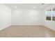 Bright bedroom with tile flooring and a large window with blinds at 335 S San Gregorio Ln, Casa Grande, AZ 85194