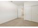 Bedroom with closet and neutral carpet at 335 S San Gregorio Ln, Casa Grande, AZ 85194