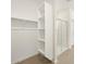 Walk-in closet with shelving and a glass-enclosed shower at 335 S San Gregorio Ln, Casa Grande, AZ 85194