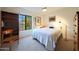 Cozy bedroom with natural light and a ceiling fan at 3417 E Mission E Ln, Phoenix, AZ 85028