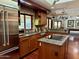 Spacious kitchen with stainless steel appliances, granite countertops, and wood cabinets at 3417 E Mission E Ln, Phoenix, AZ 85028