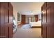 Bright bedroom with built-in storage and slider to a scenic view at 3417 E Mission E Ln, Phoenix, AZ 85028