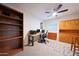 Dedicated home office with built-in shelves, desk area, and natural light from window at 3417 E Mission E Ln, Phoenix, AZ 85028
