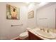 Charming powder room featuring a decorative sink and vintage accents at 3417 E Mission E Ln, Phoenix, AZ 85028
