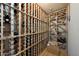 Spacious wine cellar featuring ample storage and wooden racks at 3417 E Mission E Ln, Phoenix, AZ 85028