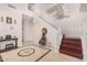 Open foyer with staircase, decorative tile, and stylish decorations at 3680 S Tower Ave, Chandler, AZ 85286