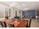 Inviting living and dining area features shutters and modern lighting at 3680 S Tower Ave, Chandler, AZ 85286