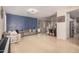 Bright living space with tile floors, modern decor, and staircase at 3680 S Tower Ave, Chandler, AZ 85286