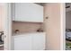 Storage area with built-in cabinets and countertop space providing ample storage and organization options at 3680 S Tower Ave, Chandler, AZ 85286