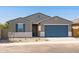 Well-maintained single-story home with desert landscaping and a two-car garage at 37357 W San Sisto Ave, Maricopa, AZ 85138