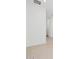 Hallway showcasing tiled flooring, white walls, and recessed lighting for a bright, clean look at 37357 W San Sisto Ave, Maricopa, AZ 85138