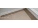 Close-up of the warm-toned tile flooring in a well-lit room at 37357 W San Sisto Ave, Maricopa, AZ 85138