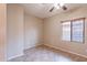 Cozy bedroom featuring tile flooring and a ceiling fan at 3765 E Oxford Ln, Gilbert, AZ 85295