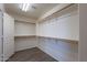 Spacious walk-in closet with ample shelving and hanging space to keep your wardrobe organized at 3765 E Oxford Ln, Gilbert, AZ 85295