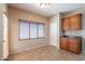 Bright dining area with a built-in cabinet and tile flooring at 3765 E Oxford Ln, Gilbert, AZ 85295