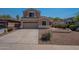 Charming two-story home features a well-maintained yard and a two-car garage at 3765 E Oxford Ln, Gilbert, AZ 85295