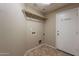 The laundry room features tile flooring and is equipped with connections for laundry machines at 3765 E Oxford Ln, Gilbert, AZ 85295