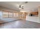 Bright living room with many windows and an open view of the kitchen at 3765 E Oxford Ln, Gilbert, AZ 85295