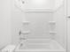 Shower-tub combination with built-in shelving at 4226 W Lisa Ln, San Tan Valley, AZ 85144
