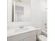 Pristine bathroom with white cabinets, a large mirror, and a shower-tub combination at 4226 W Lisa Ln, San Tan Valley, AZ 85144