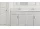 Bright bathroom featuring a double sink vanity with new fixtures and ample cabinet space at 4226 W Lisa Ln, San Tan Valley, AZ 85144