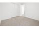Bright bedroom showcasing a closet and neutral-toned carpeting at 4226 W Lisa Ln, San Tan Valley, AZ 85144
