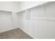 A modern closet includes rods and shelving for organized storage within a bright, neutral space at 4226 W Lisa Ln, San Tan Valley, AZ 85144
