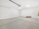 Spacious two-car garage with concrete flooring at 4226 W Lisa Ln, San Tan Valley, AZ 85144