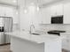 Close up of kitchen featuring quartz countertops, stainless appliances, and white cabinetry at 4226 W Lisa Ln, San Tan Valley, AZ 85144
