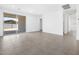 Bright living room with tile flooring and sliding glass doors to the backyard patio at 4226 W Lisa Ln, San Tan Valley, AZ 85144