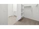 Walk-in closet located off the bathroom features shelving and rod for convenient storage at 4226 W Lisa Ln, San Tan Valley, AZ 85144