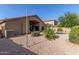Backyard with desert landscaping, patio and pool area at 43121 W Sunland Dr, Maricopa, AZ 85138