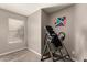 Spare bedroom with geometric art and simple furnishings with natural light at 43121 W Sunland Dr, Maricopa, AZ 85138