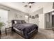 Relaxing main bedroom with soft lighting and carpet flooring at 43121 W Sunland Dr, Maricopa, AZ 85138