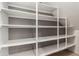 Walk-in pantry with multiple shelves providing ample storage space at 4322 S Ranger Trl, Gilbert, AZ 85297