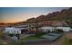 Aerial view of the property with a pool, a basketball court, and a putting green at 4763 N 53Rd St, Phoenix, AZ 85018