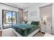 Serene bedroom with a luxurious bed, neutral tones, and direct access to the outdoor pool and patio at 4763 N 53Rd St, Phoenix, AZ 85018