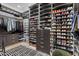 Well-organized walk-in closet featuring custom shelving, drawers, and ample storage at 4763 N 53Rd St, Phoenix, AZ 85018