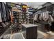 Spacious walk-in closet with custom shelving, drawers, and a central island at 4763 N 53Rd St, Phoenix, AZ 85018