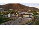 Elegant home with well-manicured landscaping, a paved driveway, and mountain views at 4763 N 53Rd St, Phoenix, AZ 85018
