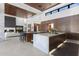 Gourmet kitchen with an open layout, featuring an island and seamless connection to the living area at 4763 N 53Rd St, Phoenix, AZ 85018