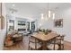 Bright, open-concept living and dining area with modern decor and a cozy fireplace creates a relaxing ambiance at 4763 N 53Rd St, Phoenix, AZ 85018
