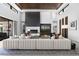 Spacious living room with high ceilings, fireplace, stylish decor, and ample natural light at 4763 N 53Rd St, Phoenix, AZ 85018