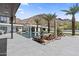 Serene pool area with modern loungers, palm trees, and mountain views, blending luxury with natural beauty at 4763 N 53Rd St, Phoenix, AZ 85018