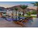 Luxurious pool and deck area with comfortable lounge seating and stunning mountain backdrop at 4763 N 53Rd St, Phoenix, AZ 85018