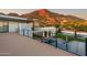 Expansive rooftop deck offering panoramic views of the pool, basketball court, and surrounding mountain landscape at 4763 N 53Rd St, Phoenix, AZ 85018